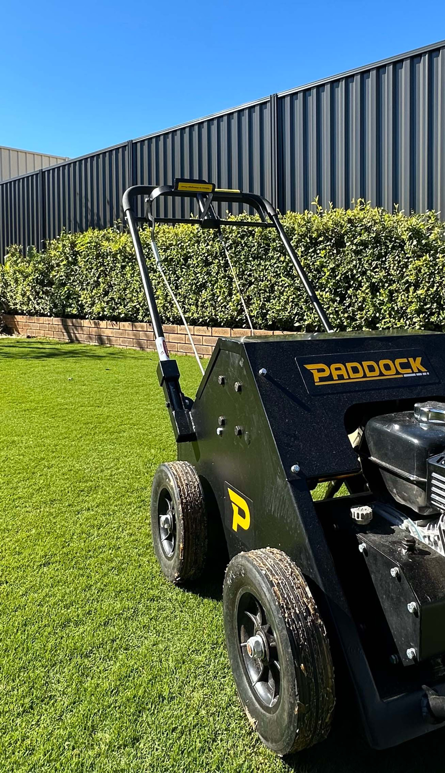 Core aeration machine on a lawn